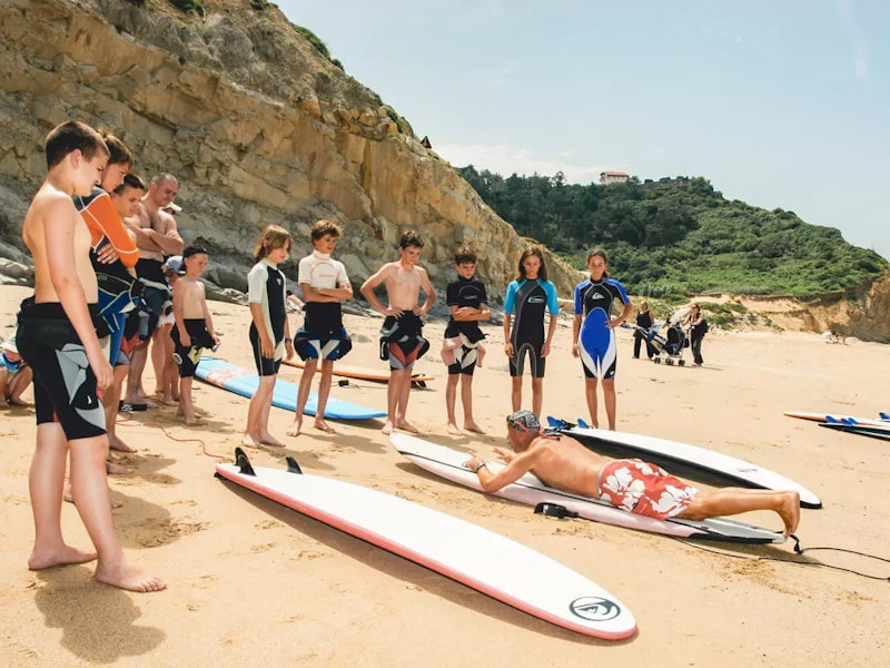 Surfunterricht am Strand