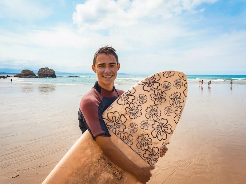 Surfer am Strand